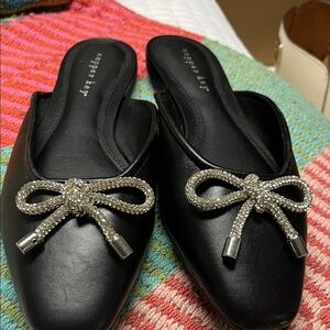 Copper Key Black Mules with Silver Bow Accent